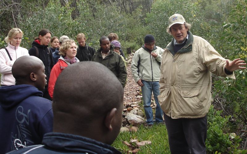 On a hiking trail during a Graduate Student Network Indibano, Professor William Bond described many of the interesting and complex aspects of fynbos and pointed out a few of the diverse plants and some of the life history differences between them.